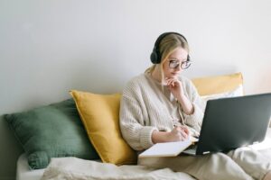 photo of woman taking notes stockpack pexels scaled