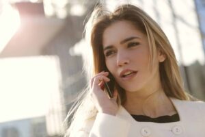 woman using smartphone stockpack pexels scaled